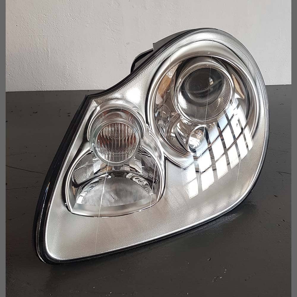 Faro delantero Porsche Cayenne 955 Xenon lado Izquierdo