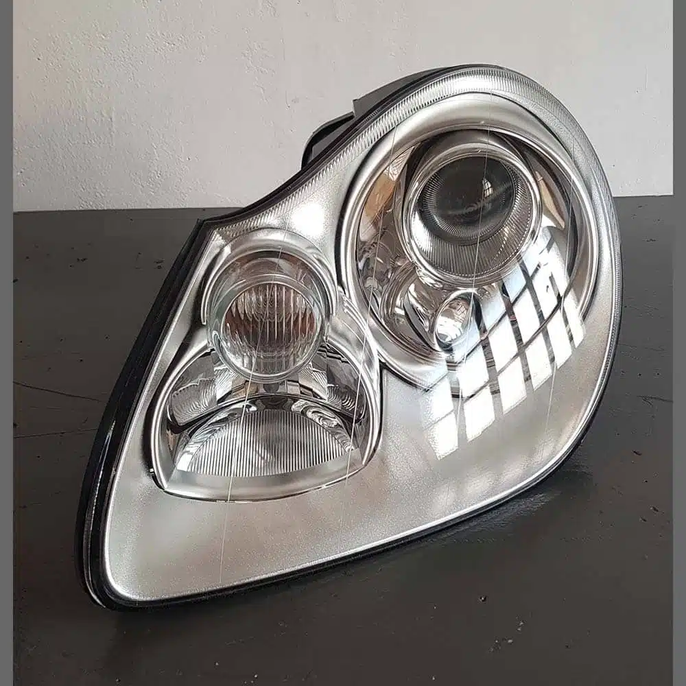 Faro delantero Porsche Cayenne 955 Xenon lado Izquierdo